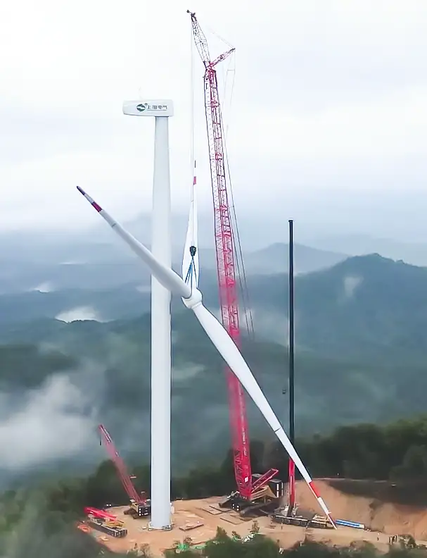 Crawler crane lifting heavy structural load showing high capacity at long radius