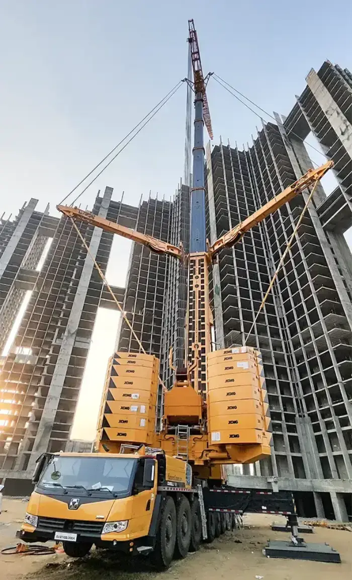Telescopic boom crane operating at Oberoi Gurugram construction site